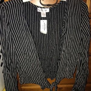 Woman’s stripped tie front top